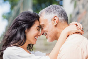 Close-up of couple embracing outdoors